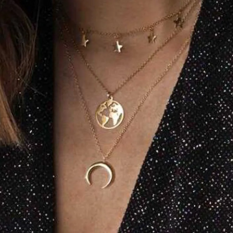 Multilayer star, moon, and earth necklace